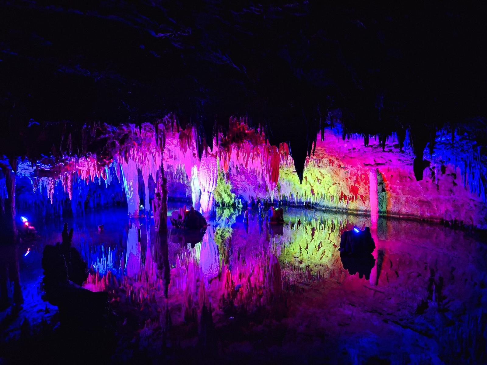 The colored light display on stalactites in Meramec Caverns, Missouri