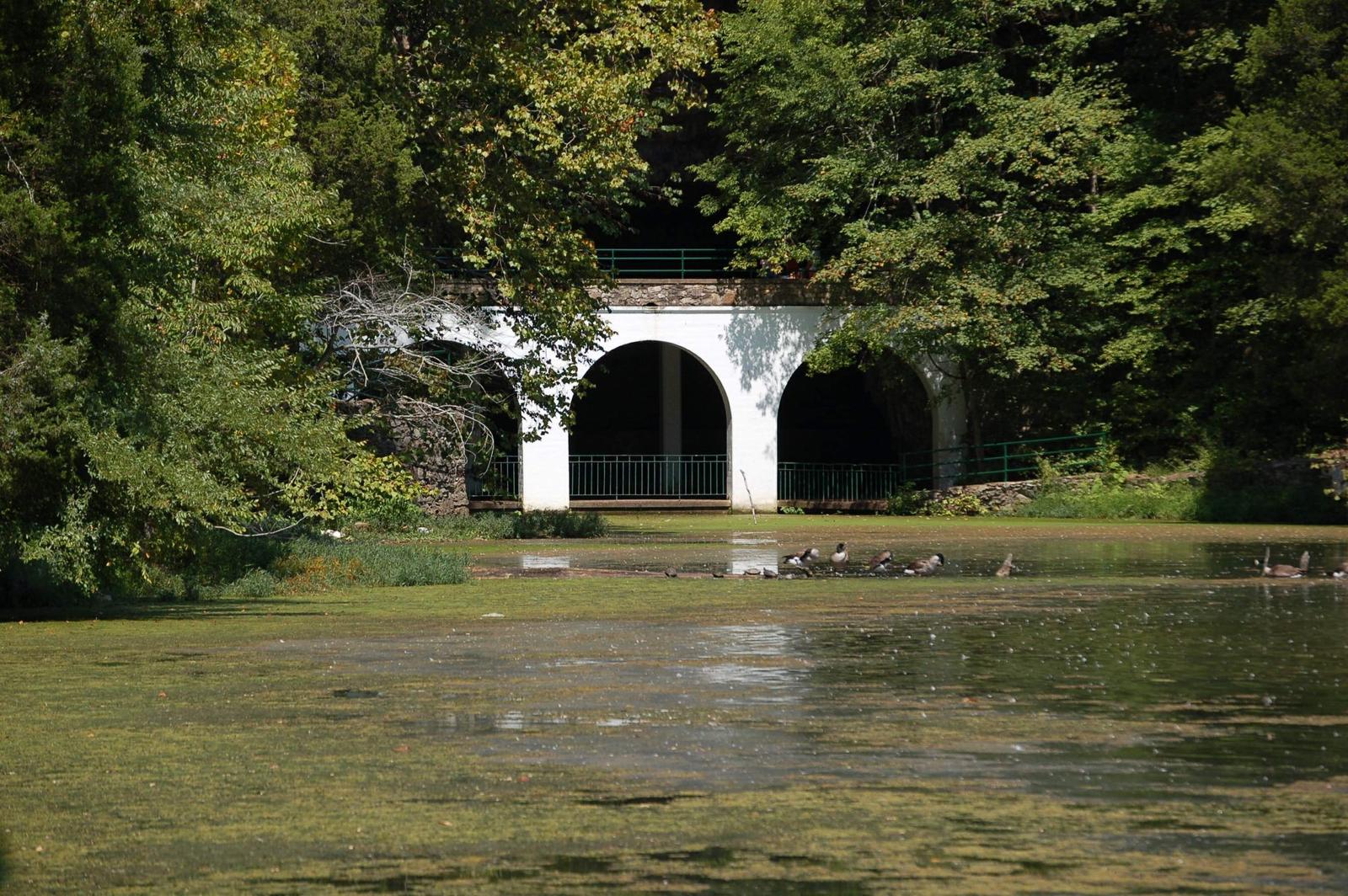 The arched entrance and lake at Dunbar Cave, Clarksville, Tennessee